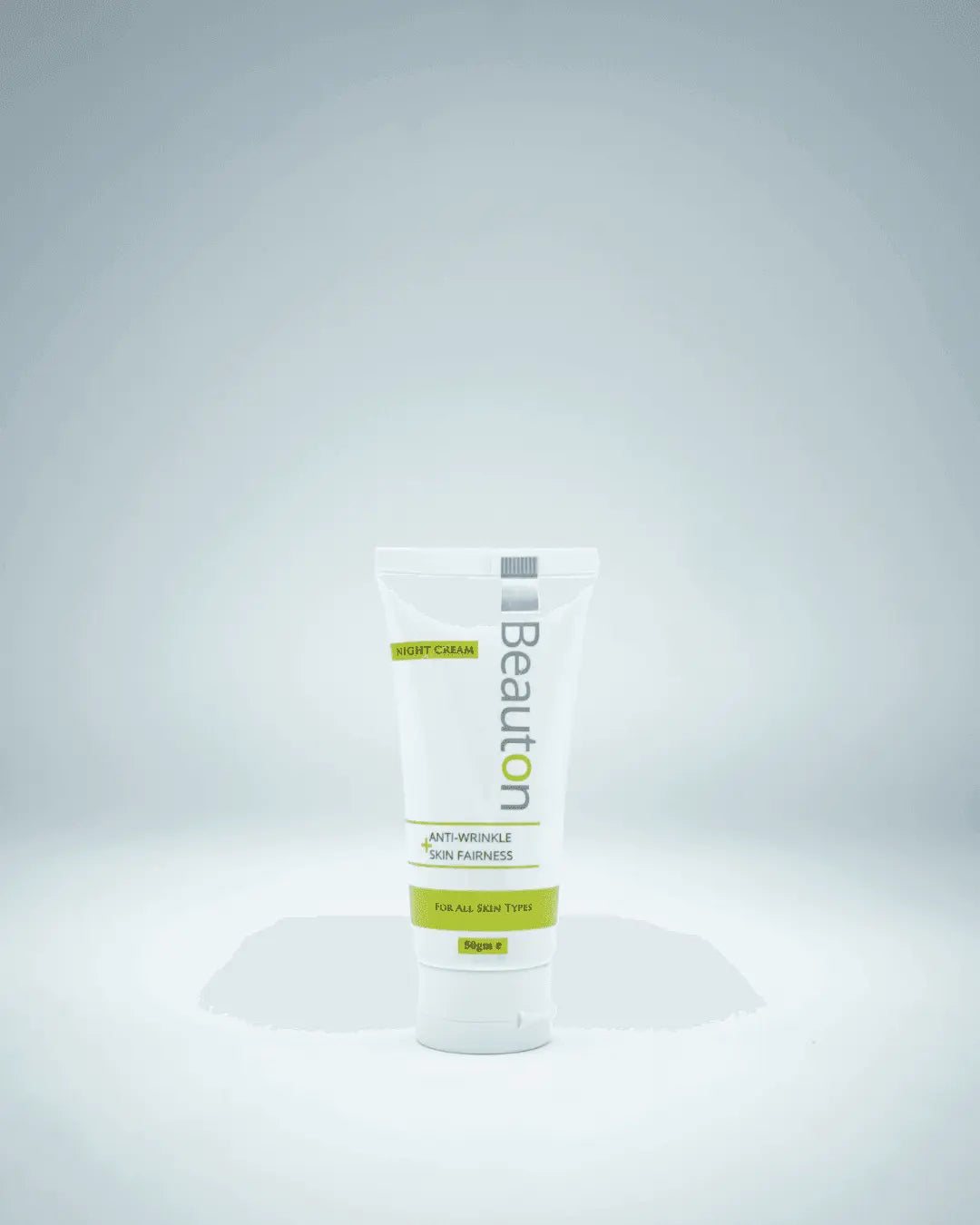 Close-up of Beauton Night Cream texture, highlighting its blend of Hydrolyzed Collagen Peptides, Alpha Arbutin, and Vitamin C for firmness and radiance.