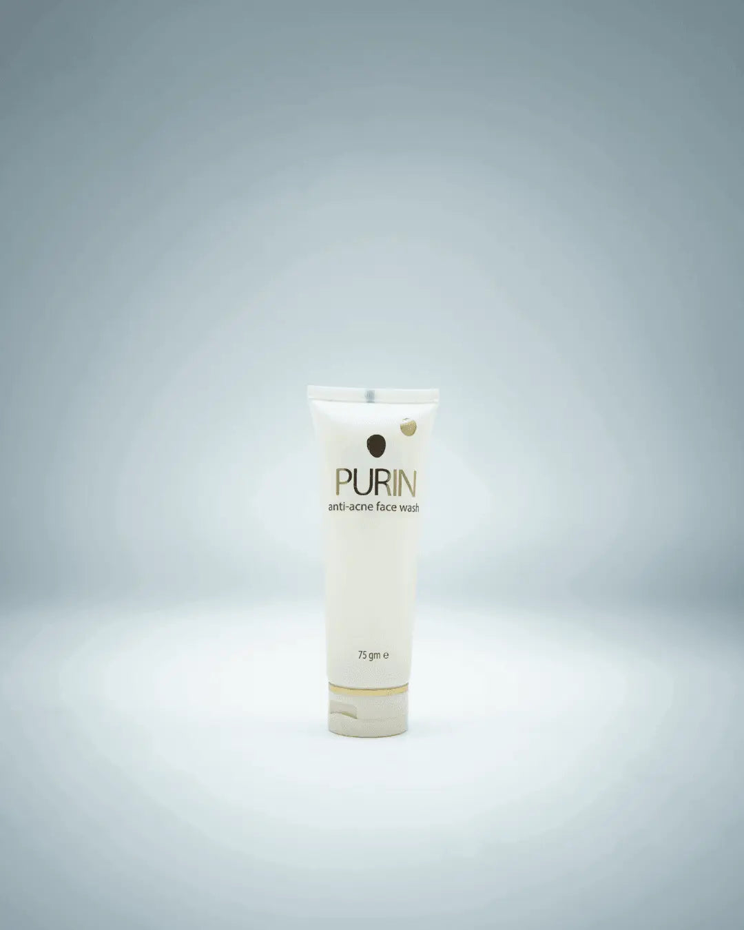 PURIN Anti-Acne Facewash bottle, a dermatologically tested and hypoallergenic cleanser for clear, fresh skin.