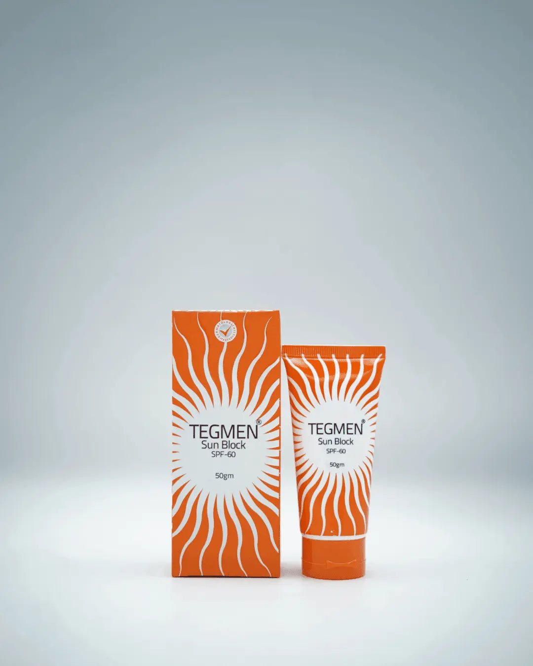 Tegmen Sunblock SPF 60 being applied to skin, showing its smooth texture that helps keep skin youthful and radiant.